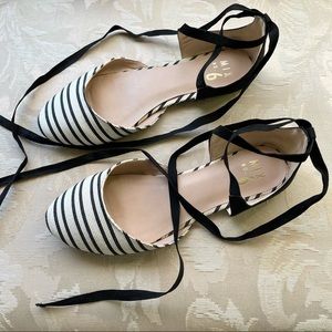 Lace up black and white dorsay flats
